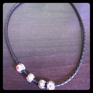 Pandora necklace with four charms